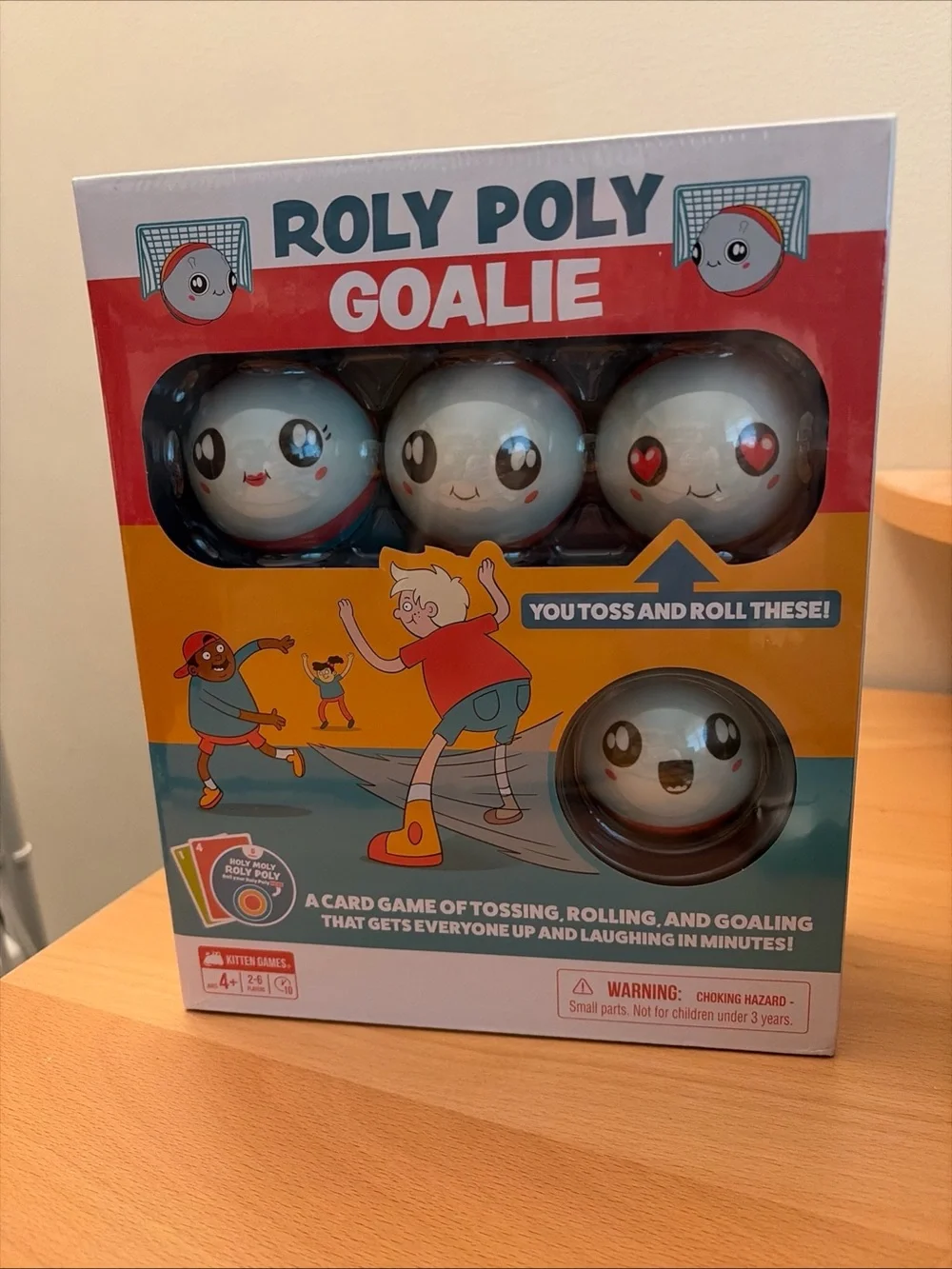 Roly Poly Goalie Kids Game - White Emoji Balls